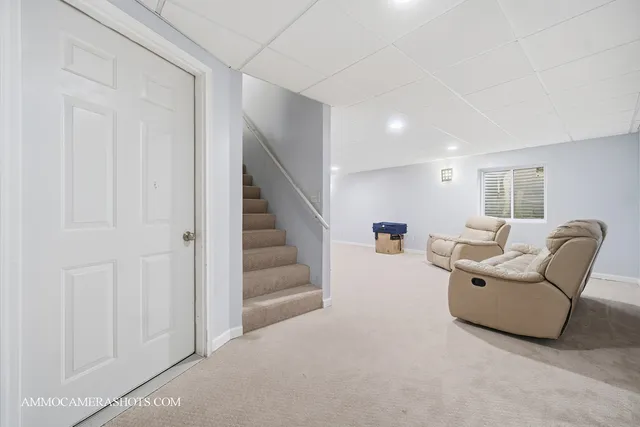 a bedroom with furniture and a couch