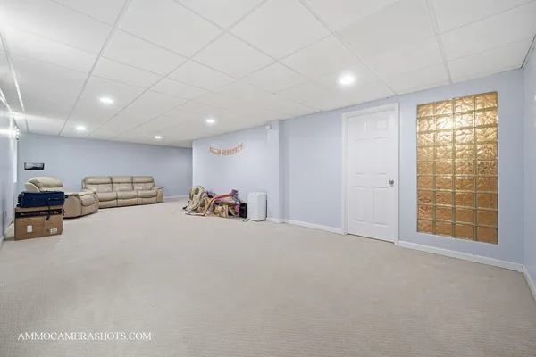 a room with furniture and natural light