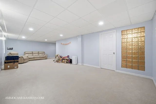 a room with furniture and natural light