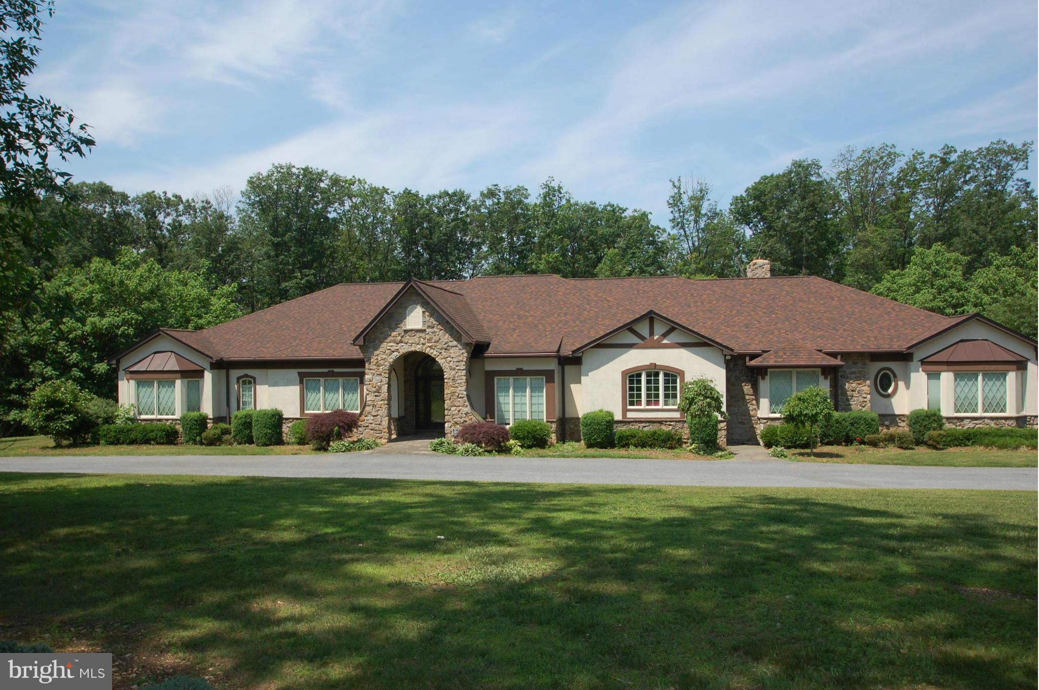 3840 Hooper Road New Windsor, MD 21776 - Photo 1 of 30 a front view of a house with a yard