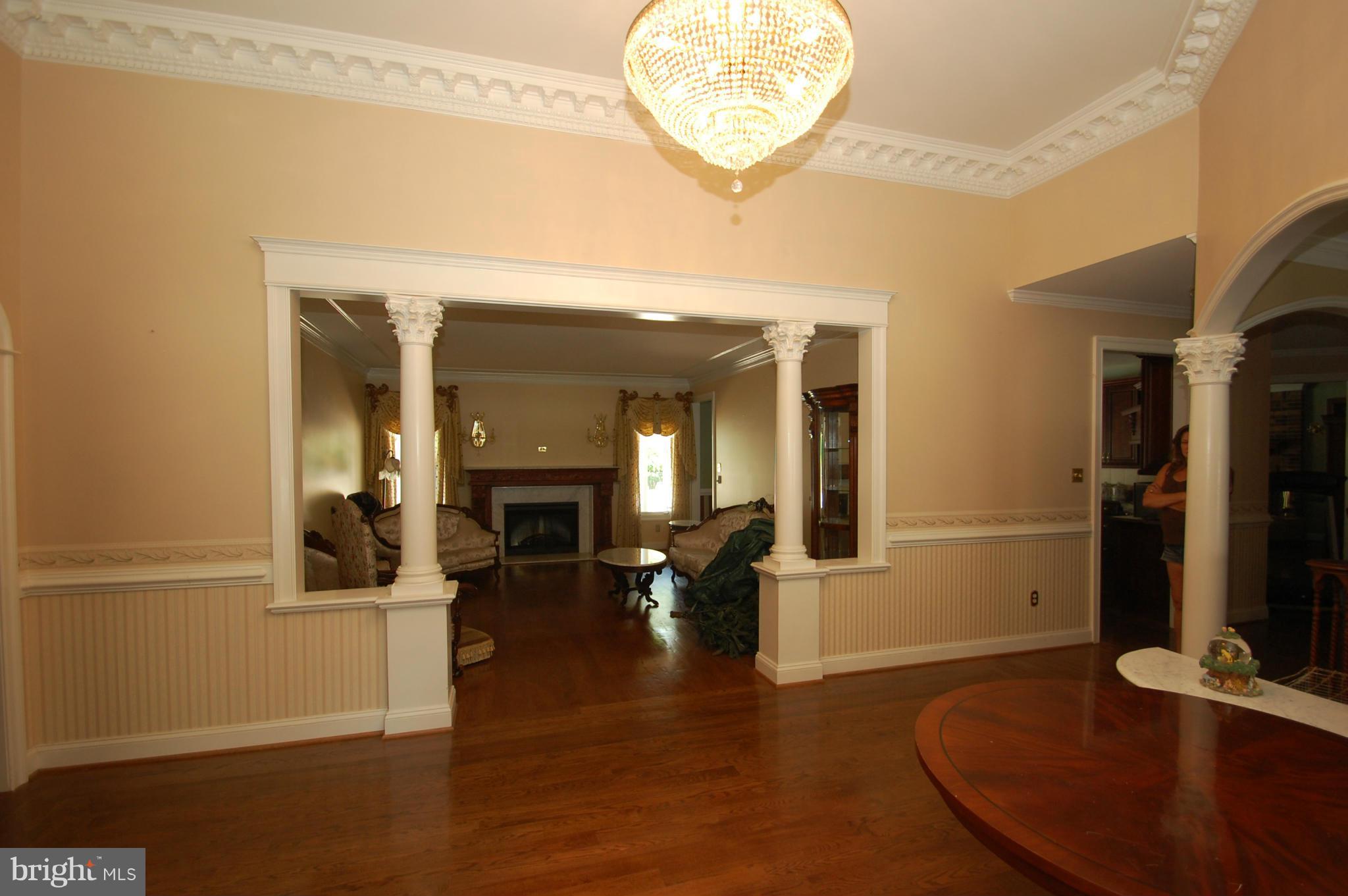 3840 Hooper Road New Windsor, MD 21776 - Photo 4 of 30 an entryway of a house with wooden floor