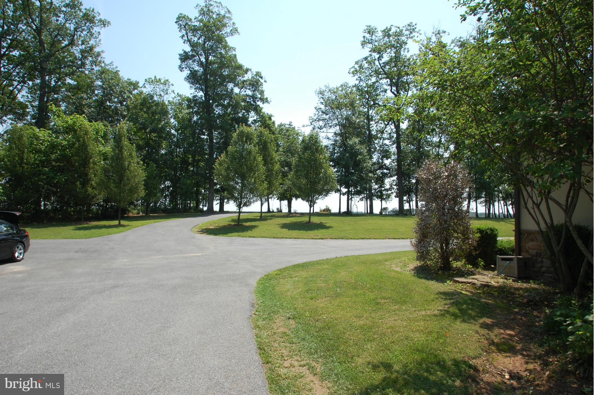 3840 Hooper Road New Windsor, MD 21776 - Photo 8 of 30 a view of swimming pool and trees