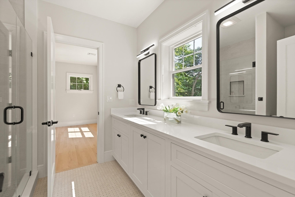 21 Columbus Street Lexington, MA 02421 - Photo 29 of 42 a bathroom with a double vanity sink mirror and double