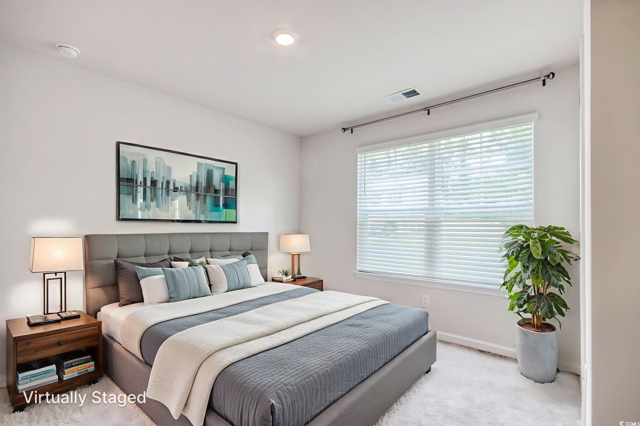 211 Seasons Trace Loop Longs, SC 29568 - Photo 4 of 37 Carpeted bedroom featuring baseboards