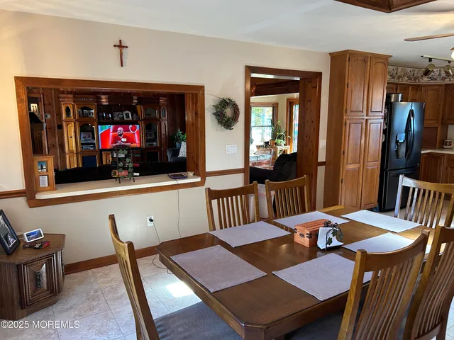 a view of a dining room with furniture