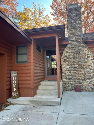 a front view of a house with garage