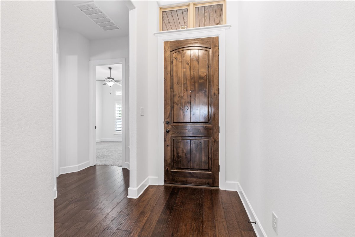 600 Garner Park Drive Georgetown, TX 78628 - Photo 3 of 39 Entryway featuring dark wood finished floors and ceiling fan