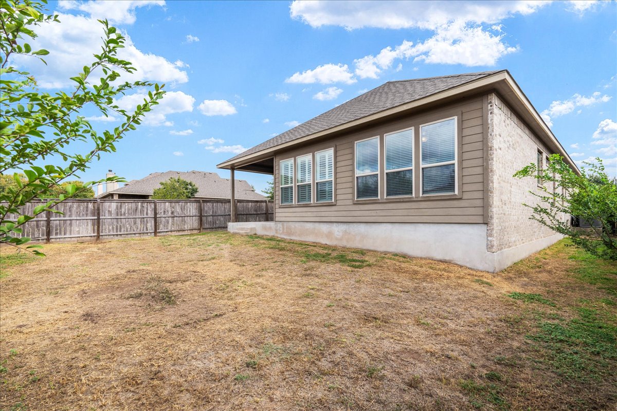 600 Garner Park Drive Georgetown, TX 78628 - Photo 29 of 39 View of home's exterior featuring a patio