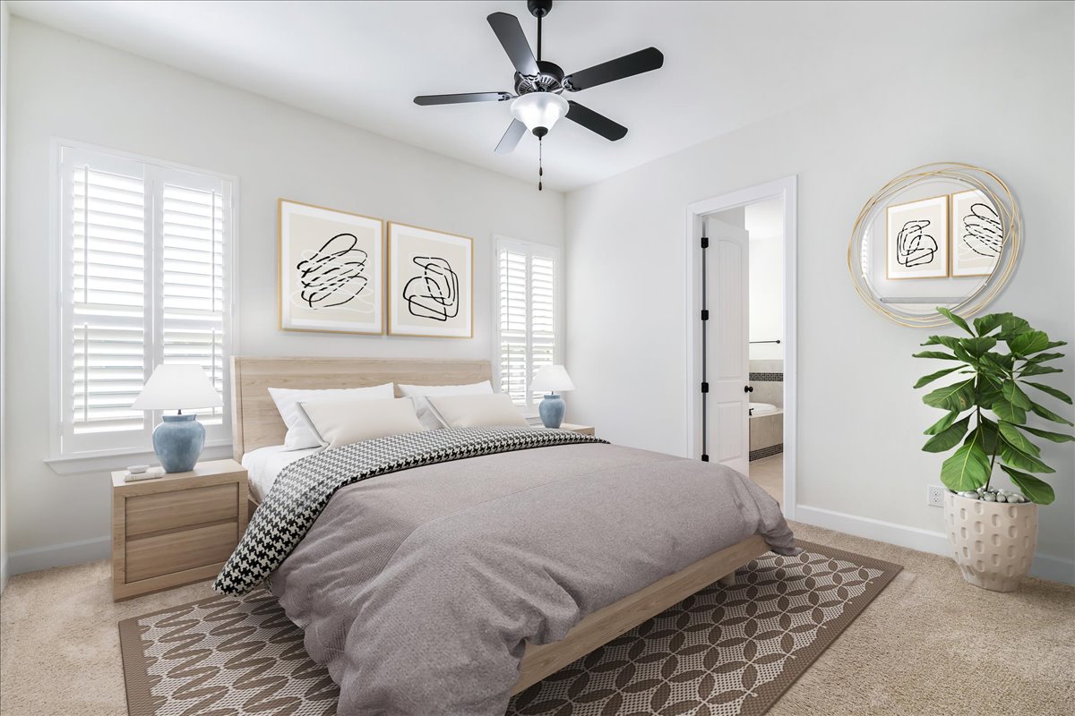 600 Garner Park Drive Georgetown, TX 78628 - Photo 35 of 39 Bedroom with light colored carpet, ensuite bathroom, and a ceiling fan