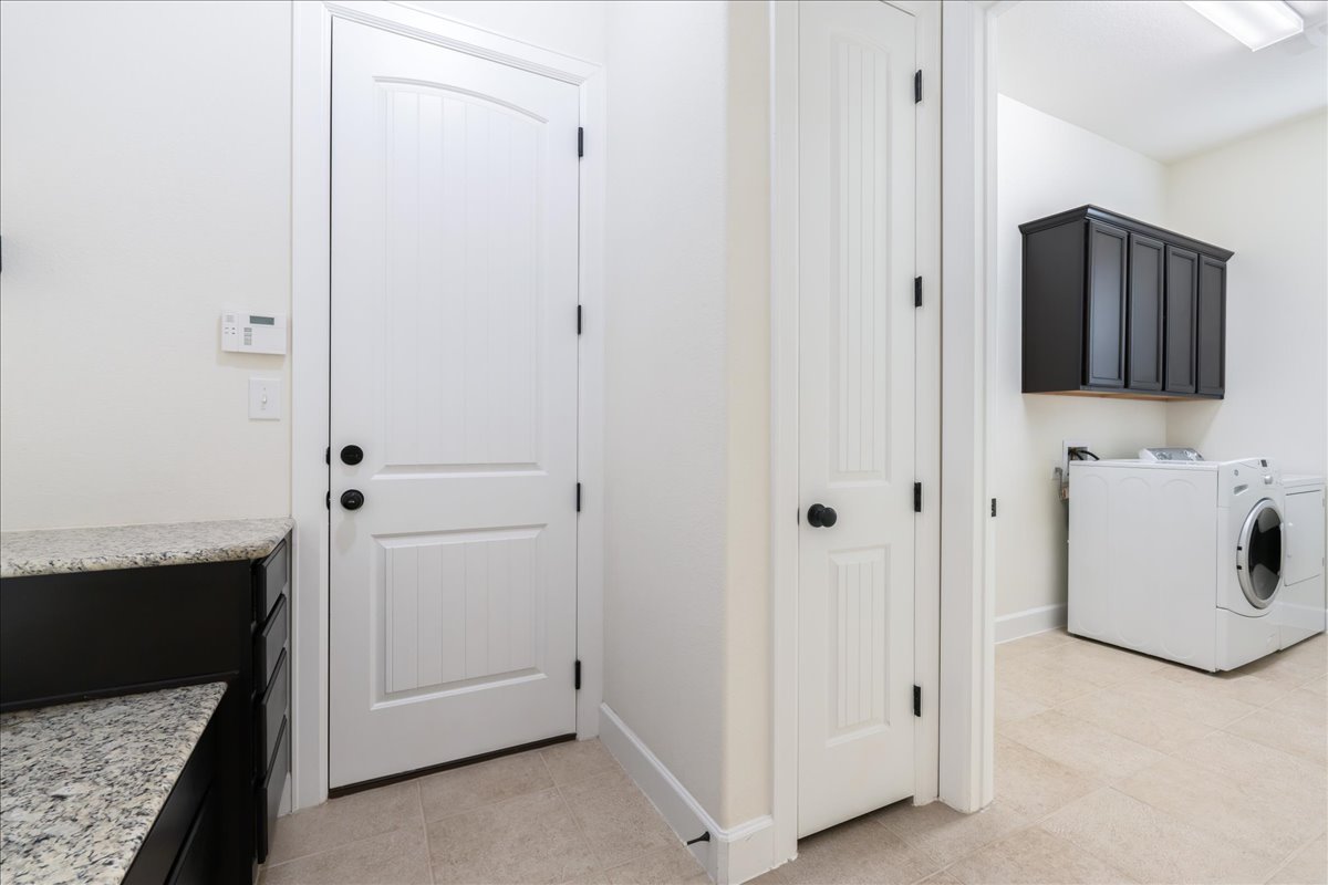600 Garner Park Drive Georgetown, TX 78628 - Photo 9 of 39 Laundry area with cabinet space