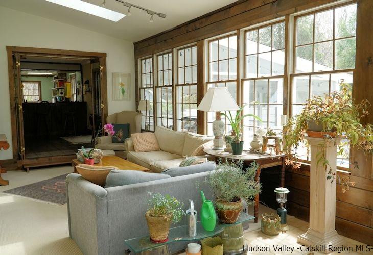 15 Hewlett Road Red Hook, NY 12571 - Photo 13 of 29 a living room with furniture and a flat screen tv