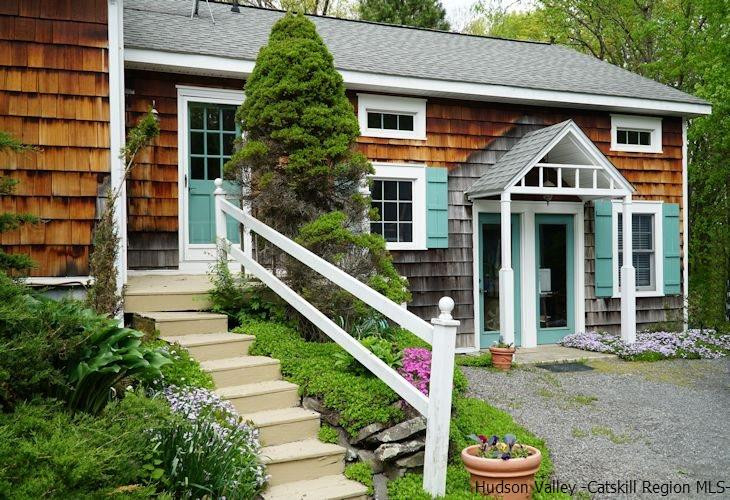 15 Hewlett Road Red Hook, NY 12571 - Photo 2 of 29 a front view of a house with garden