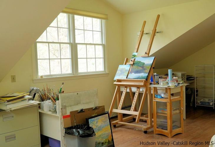 15 Hewlett Road Red Hook, NY 12571 - Photo 22 of 29 a room with gym equipment and windows