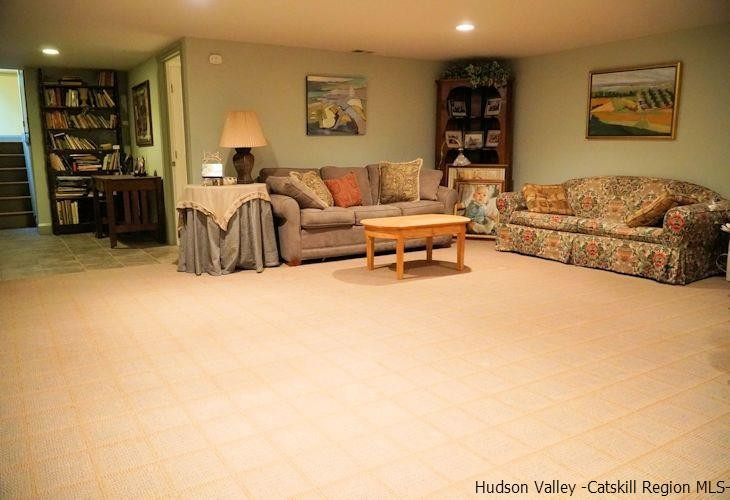 15 Hewlett Road Red Hook, NY 12571 - Photo 23 of 29 a living room with furniture and a couch