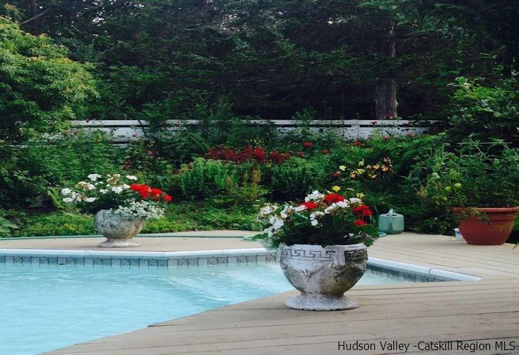 15 Hewlett Road Red Hook, NY 12571 - Photo 27 of 29 a view of a garden with flowers and flowers