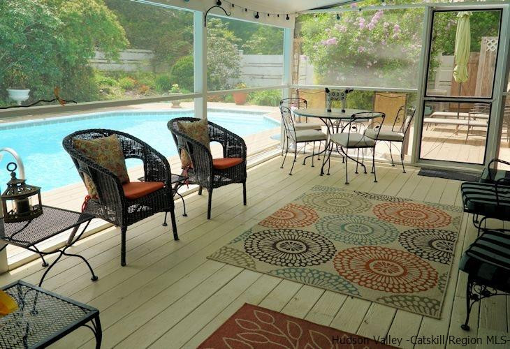 15 Hewlett Road Red Hook, NY 12571 - Photo 28 of 29 a view of a dinning table and chairs in patio