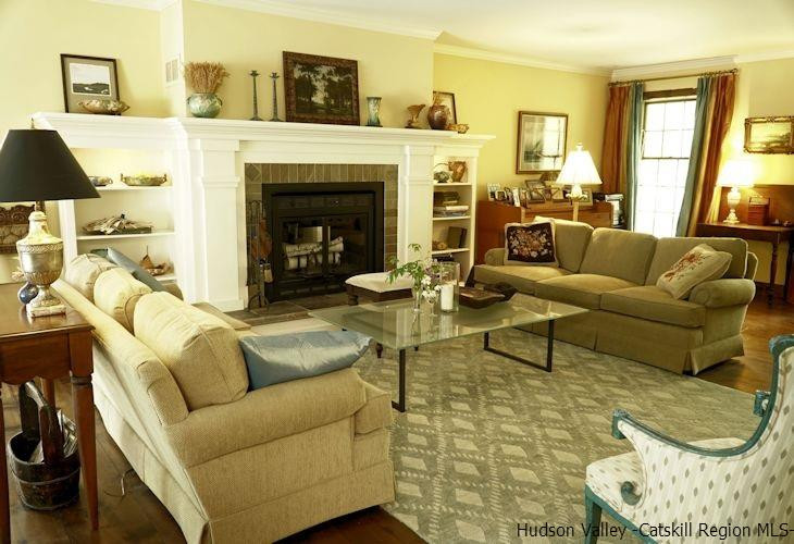 15 Hewlett Road Red Hook, NY 12571 - Photo 8 of 29 a living room with furniture and a fireplace