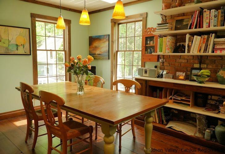 15 Hewlett Road Red Hook, NY 12571 - Photo 9 of 29 a view of a dining room with furniture and a book shelf