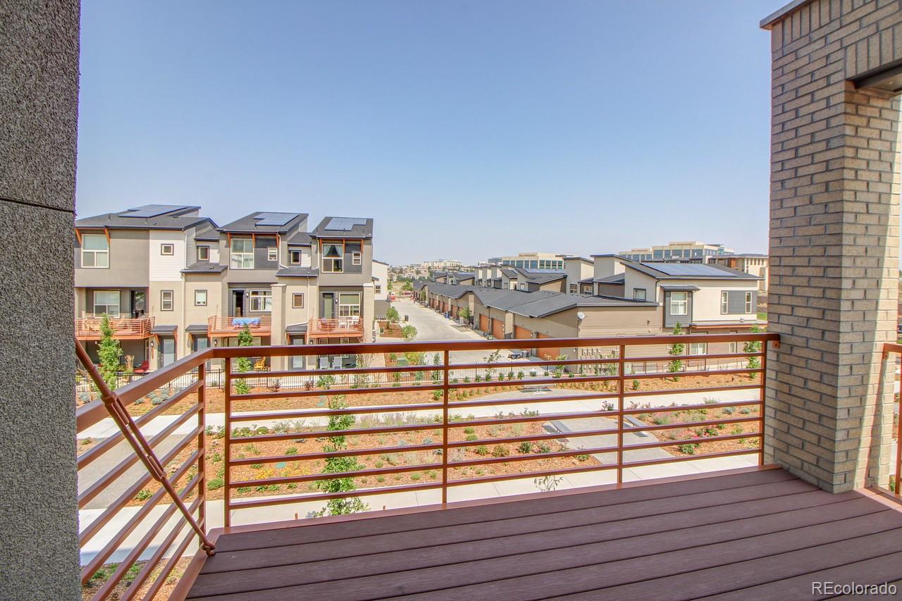 10122 Belvedere Loop Lone Tree, CO 80124 - Photo 3 of 17 a view of a balcony with city view