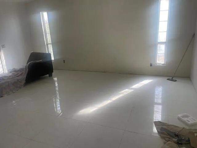 a workspace with furniture and window