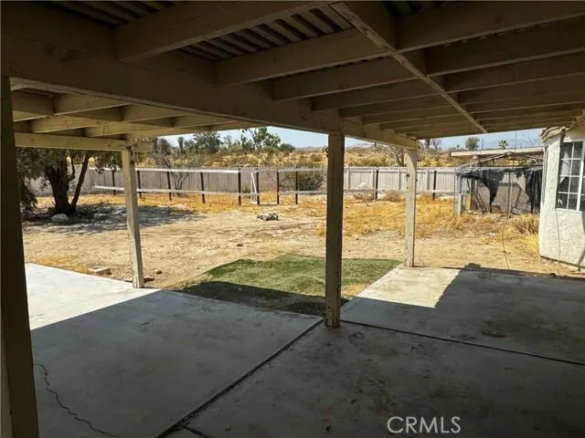 a room with furniture a window and a glass door