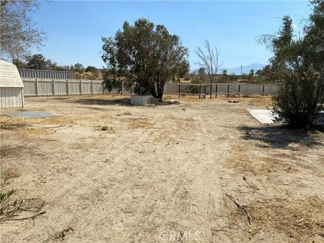 a balcony with table and chairs