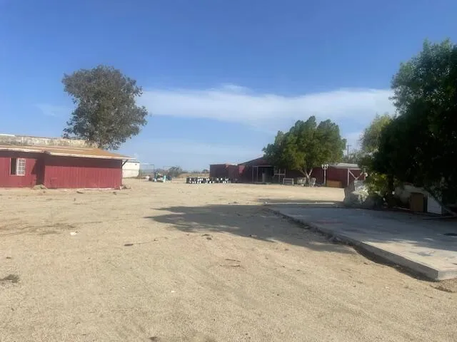 a view of a porch with wooden floor