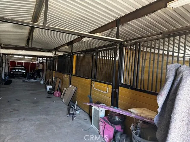 a view of a house with a tree and a yard