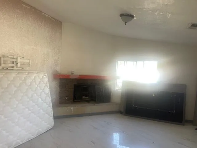 a kitchen with stainless steel appliances a sink a stove and a refrigerator