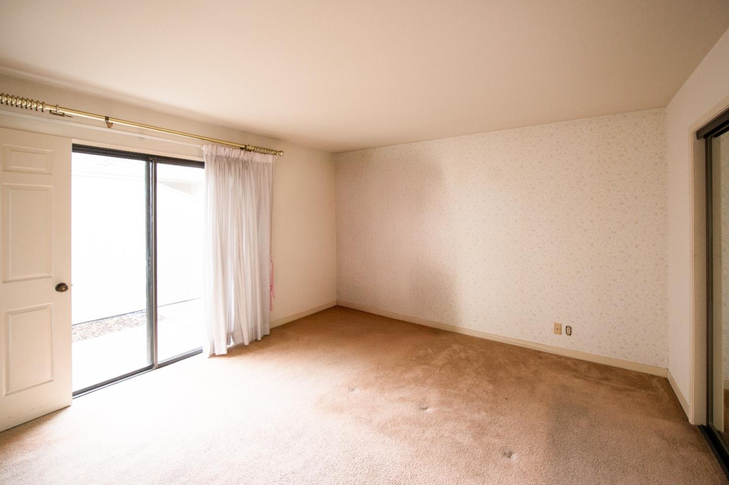 134 Nissen Road, Unit 2 Salinas, CA 93901 - Photo 10 of 27 an empty room with a empty space and a window