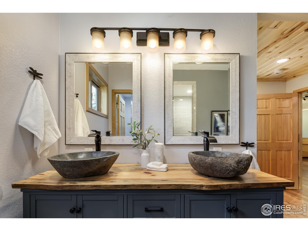 321 May Avenue Lyons, CO 80540 - Photo 21 of 50 a view of living room with furniture and wooden floor