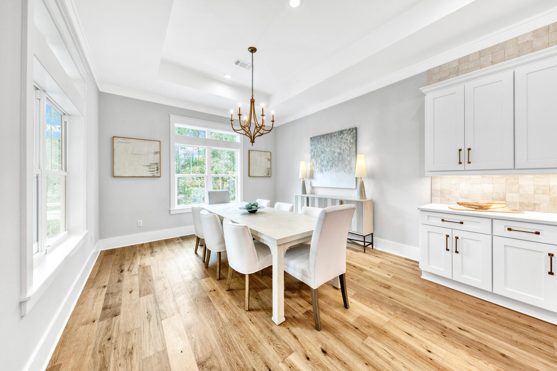 133 Dune Drive Santa Rosa Beach, FL 32459 - Photo 13 of 64 a view of a dining room with furniture window and wooden floor