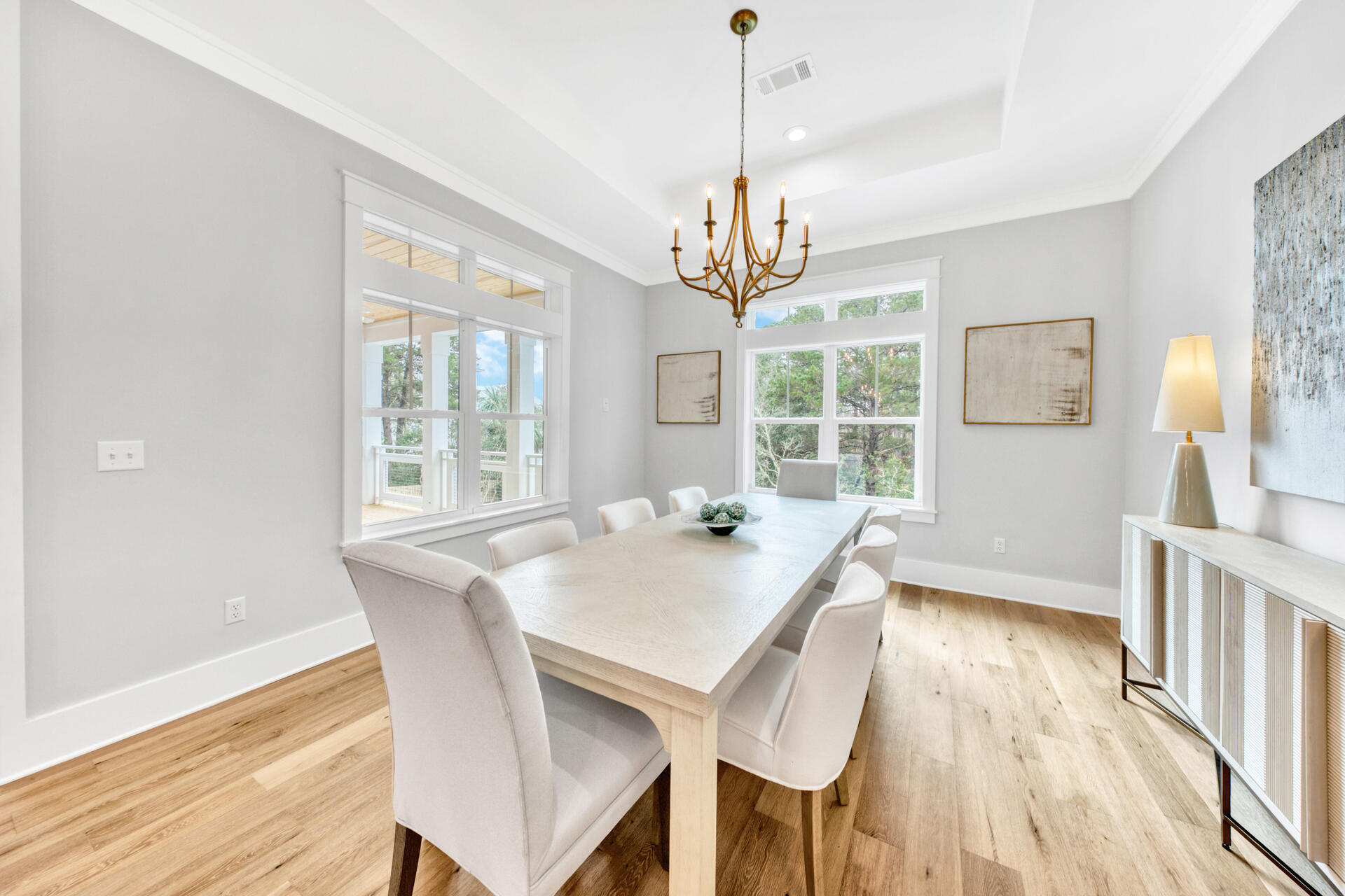 133 Dune Drive Santa Rosa Beach, FL 32459 - Photo 14 of 64 a view of a dining room with furniture window and wooden floor