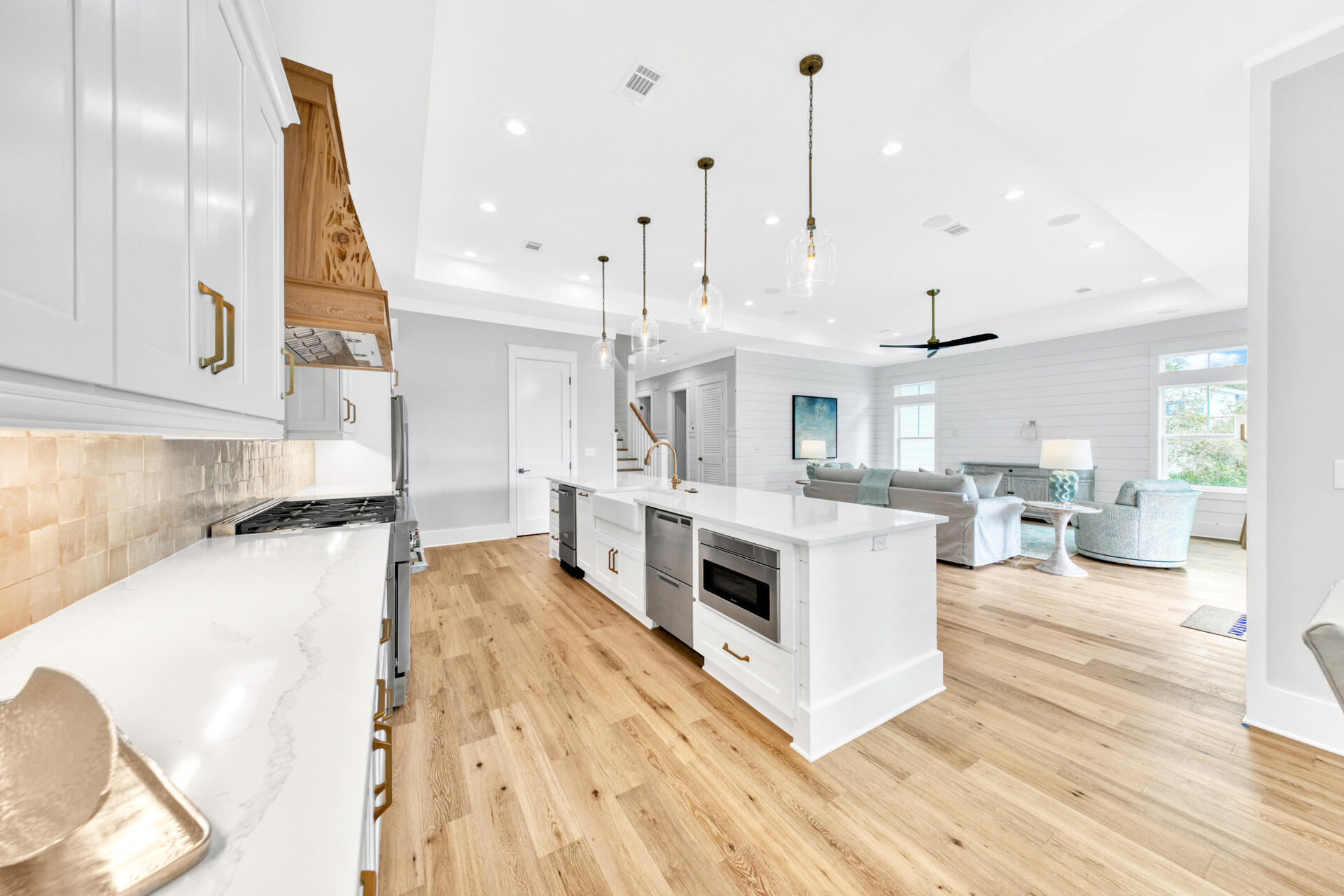 133 Dune Drive Santa Rosa Beach, FL 32459 - Photo 16 of 64 a large white kitchen with stainless steel appliances