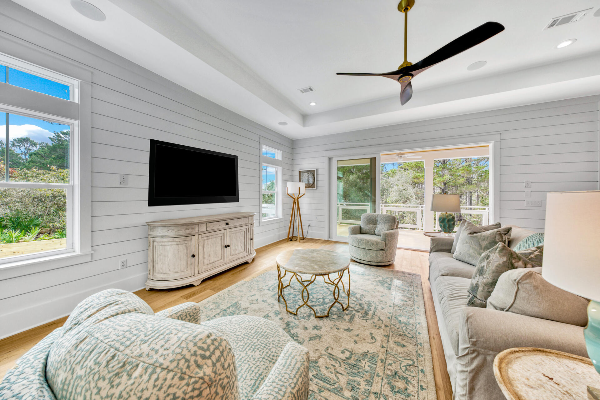 133 Dune Drive Santa Rosa Beach, FL 32459 - Photo 21 of 64 a living room with furniture and a flat screen tv