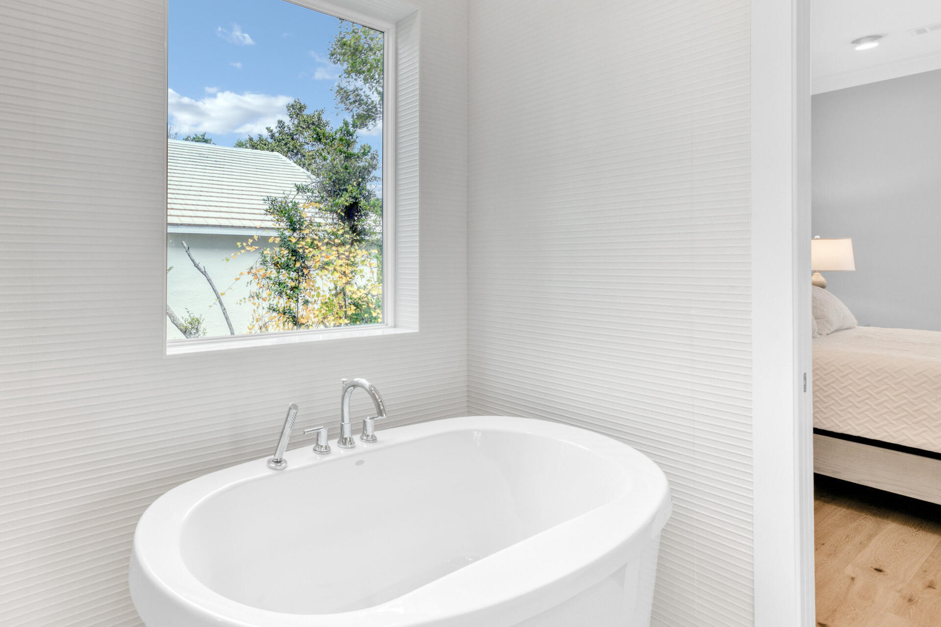 133 Dune Drive Santa Rosa Beach, FL 32459 - Photo 26 of 64 a white bath tub sitting next to a white sink