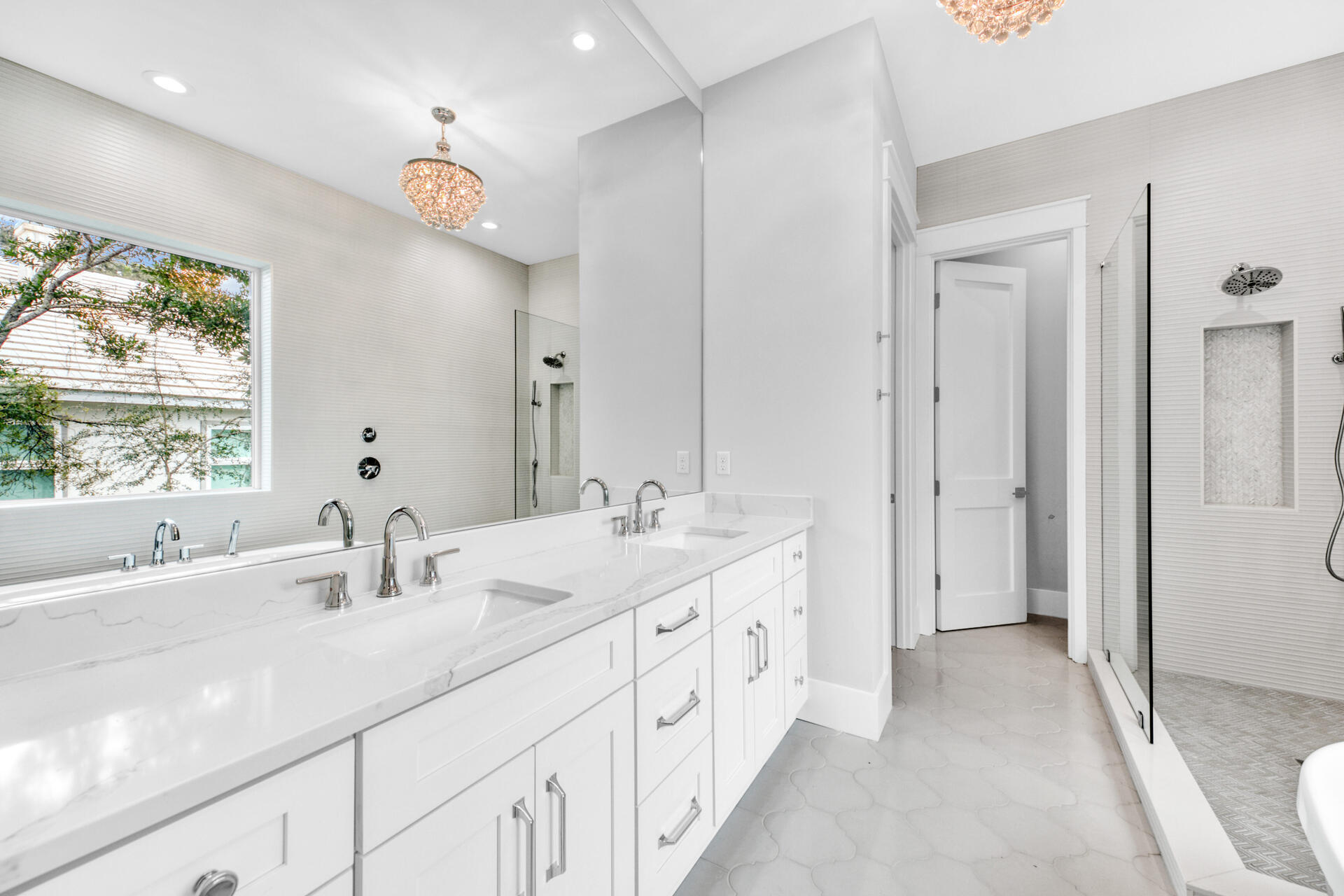 133 Dune Drive Santa Rosa Beach, FL 32459 - Photo 27 of 64 a bathroom with double vanity and a mirror