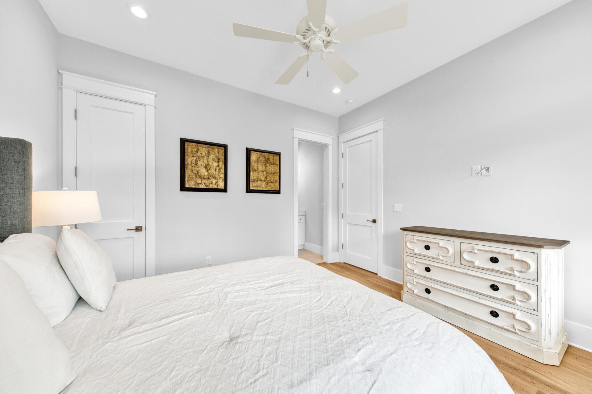 133 Dune Drive Santa Rosa Beach, FL 32459 - Photo 29 of 64 a bedroom with a bed and a painting on the wall