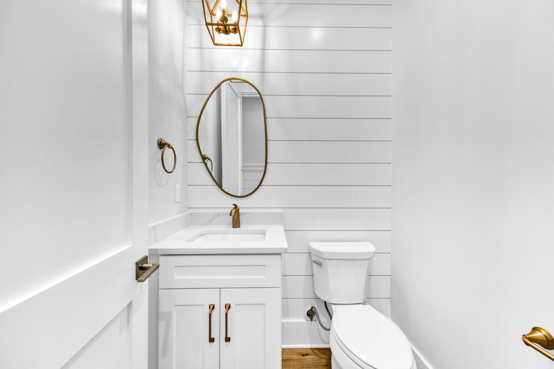 133 Dune Drive Santa Rosa Beach, FL 32459 - Photo 31 of 64 a bathroom with a sink a toilet and a mirror