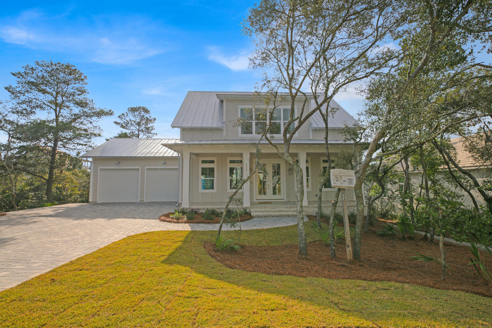 133 Dune Drive Santa Rosa Beach, FL 32459 - Photo 57 of 64 a front view of a house with a yard