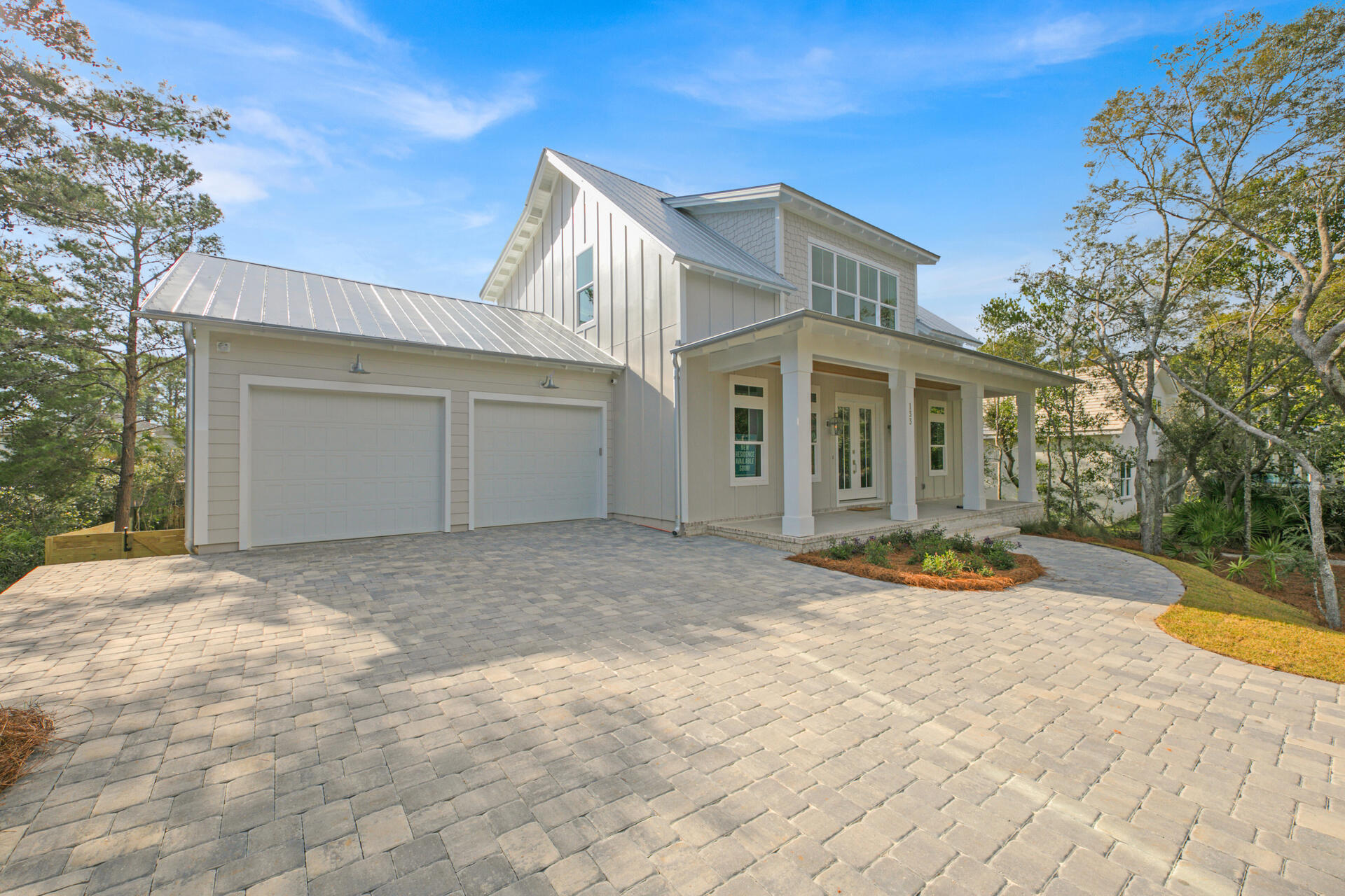 133 Dune Drive Santa Rosa Beach, FL 32459 - Photo 58 of 64 a view of a white house with a yard and large tree