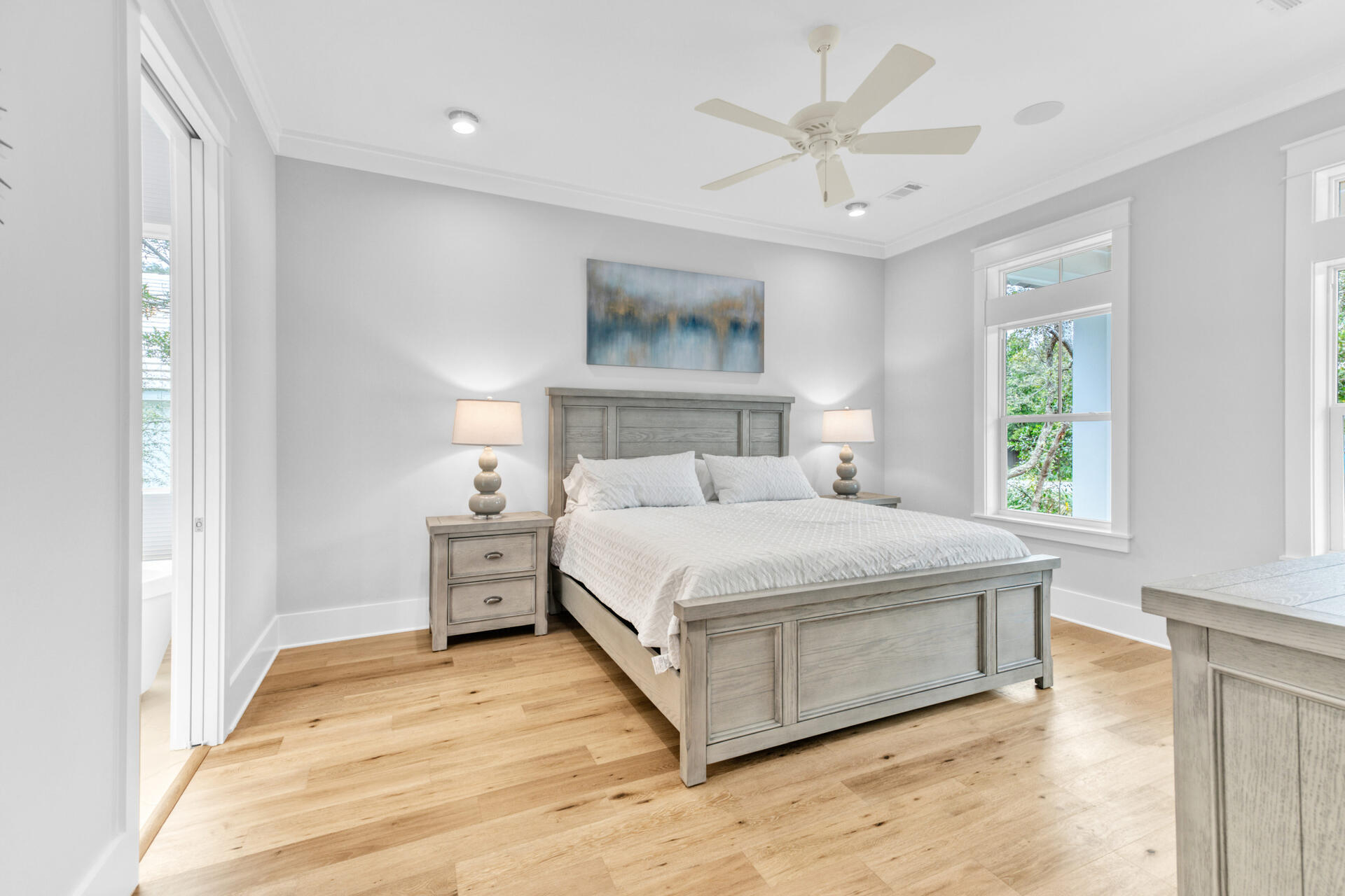 133 Dune Drive Santa Rosa Beach, FL 32459 - Photo 9 of 64 a bedroom with a large bed and a chandelier