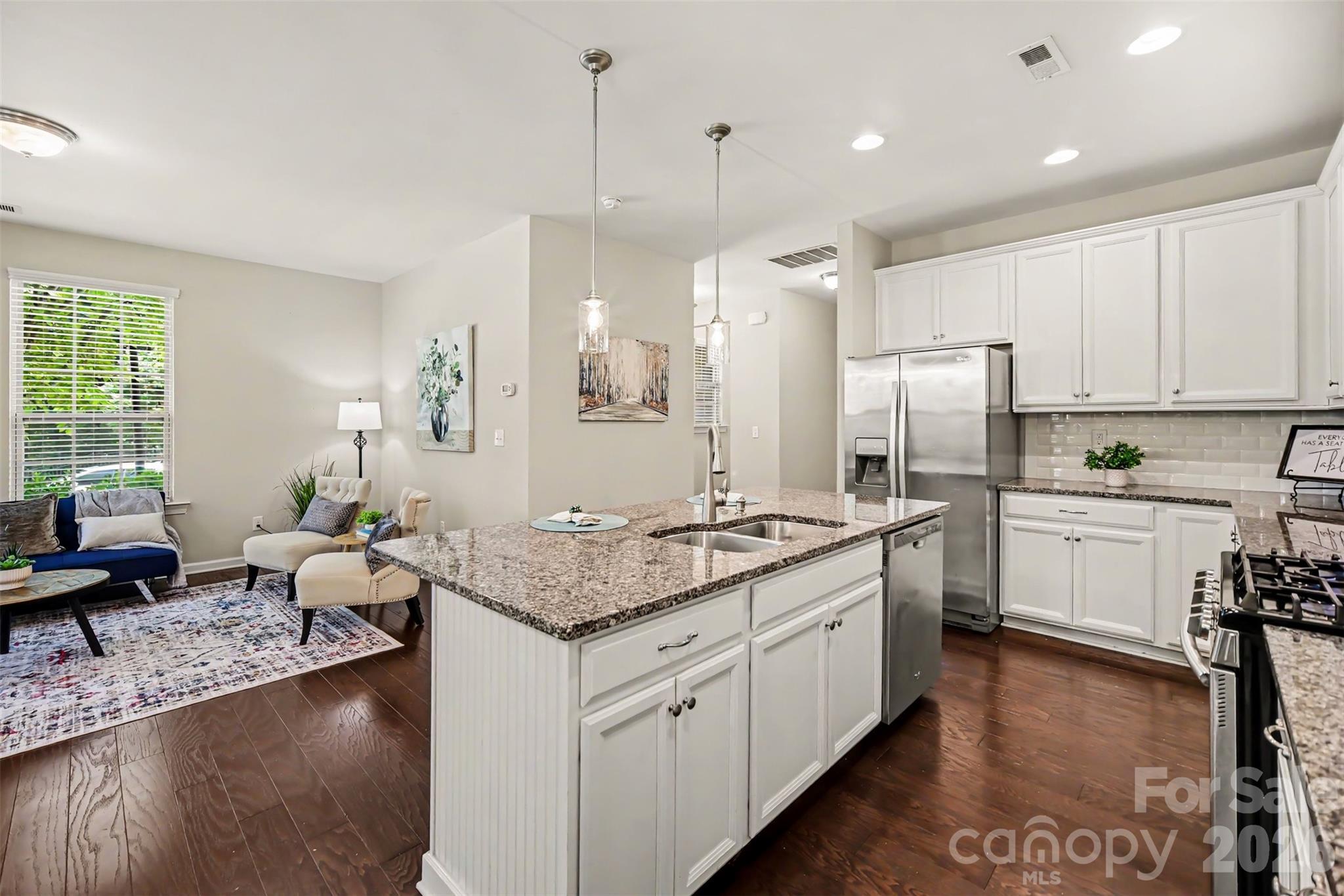 1029 Archibald Avenue Fort Mill, SC 29708 - Photo 10 of 45 a kitchen with a sink stove and refrigerator
