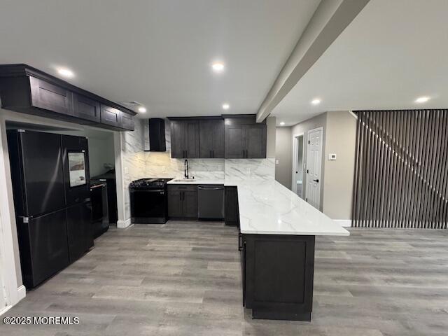 21 Appleton Drive Hazlet, NJ 07730 - Photo 15 of 24 a large room with stainless steel appliances kitchen island a sink dishwasher a refrigerator and a oven with wooden floor