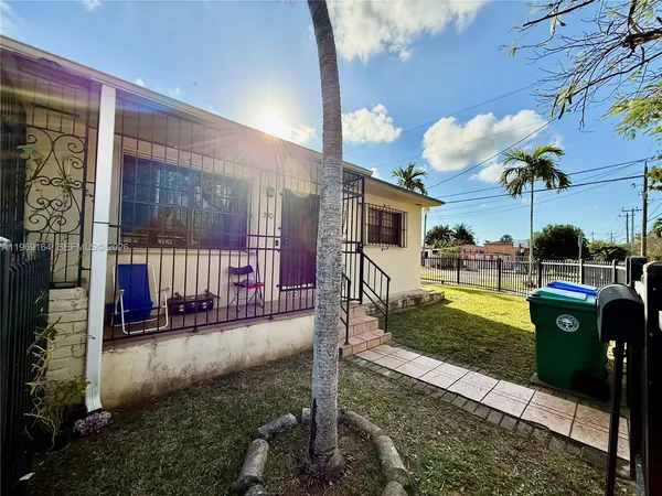 a view of a porch with sitting area