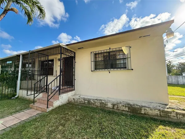 a view of a porch with a yard