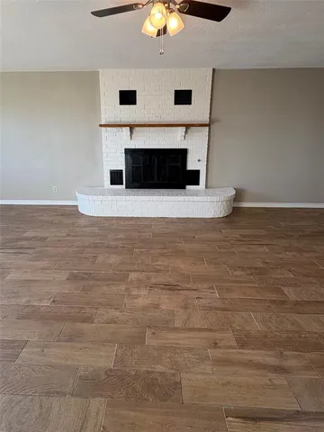 a view of fireplace and microwave