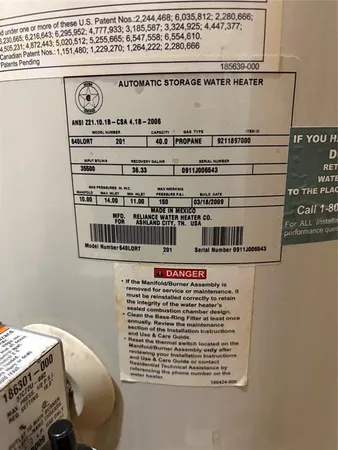 a view of a house with a big yard and large trees