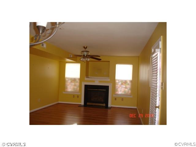 2714 Amherst Ridge Loop Colonial Heights, VA 23834 - Photo 4 of 12 a black and white photo of a living room