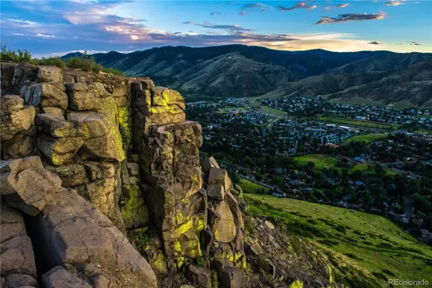 a view of a yard and mountain view in back